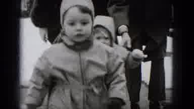 Middletown Pennsylvania-1975: Two Children Playing In The Snow In Winter Snowsuits