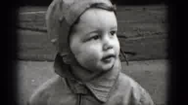 Middletown Pennsylvania (1975): A Toddler Wearing A Hoodie Looking To Her Left