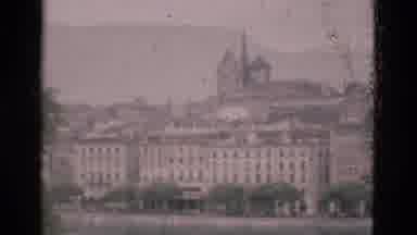 Portugal (1975): Camera Pans Across The Cityscape To Show Off Buildings And