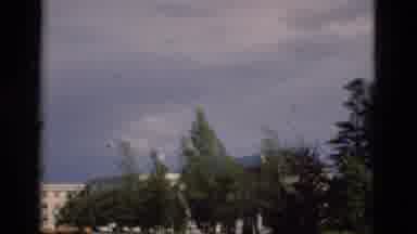Portugal (1975): Pan Of Building In The Middle Of Trees On The Edge Of A Small