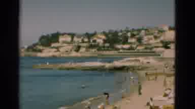 Portugal (1975): View Of The Beach People Swimming Cabanas And Neighboring City