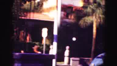 Florida Everglades USA (1975): People Walking Past Bell Tower On A Bright Sunny