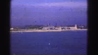 Florida Everglades USA (1975): Boat Sails Through The Blue Water Towards Its