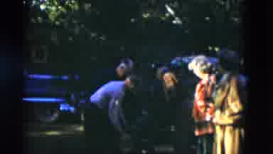 Somerset Kentucky USA (1975): A Group Of Men Trying To Lift A Log In The Park