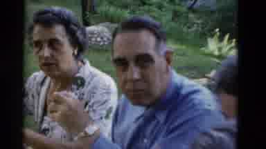 Somerset Kentucky USA (1975): Family Chewing Food And Smiling As The Eat Together