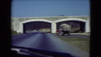 Middletown Pennsylvania (1975): Passing View Of Red And Yellow Flowers With Truck