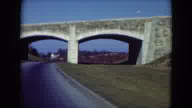 Middletown Pennsylvania (1975): Car Driving Under The Bridge While The Sunset With