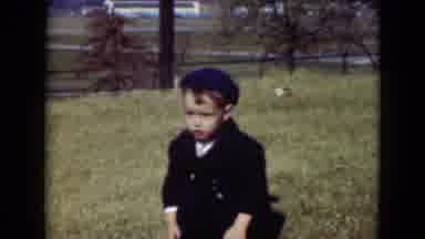 Middletown Pennsylvania (1975): Young Boy In Navy Blue Suit And Hat Kneeling On