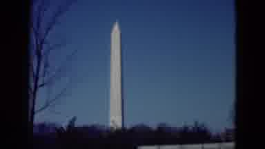 Middletown Pennsylvania (1975): Tall Monument Discolored Bricks Moving Cars Bare