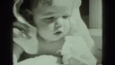 Middletown Pennsylvania (1975): A Baby Wrapped In A Towel By A Window In The