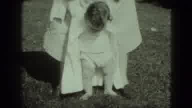 Middletown Pennsylvania (1975): Holding A Child's Hand While Teaching Them How To