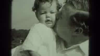 Middletown Pennsylvania (1975): Father Holding And Kissing Baby