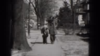 Middletown Pennsylvania (1975): Mother And Child Holding Hands While Walking