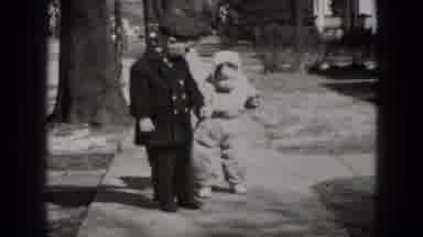 Middletown Pennsylvania (1975): Two Toddlers Slowly Walking Together Down A