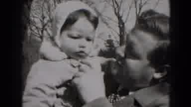 Middletown Pennsylvania (1975): An Older Gentleman Comes Home From Work And Plays