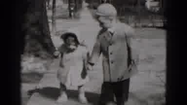 Middletown Pennsylvania (1975): The Elder Child Hold His Sister Hand For Walking