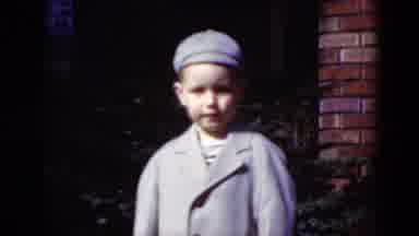 Middletown Pennsylvania (1975): A Well Dressed Child Turns And Talks To The Camera