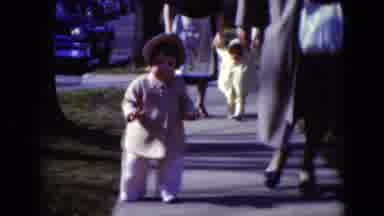Middletown Pennsylvania (1975): Adults And Toddlers Taking A Walk Outside On A
