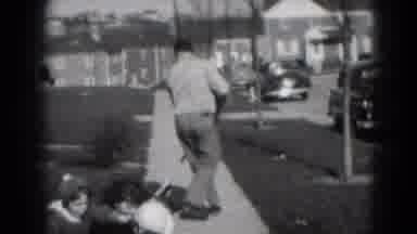 Middletown Pennsylvania (1975): Man Is Mowing His Lawn Then Two Children Play In
