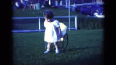 Middletown Pennsylvania (1975): Girl Picks Up Chair And Moves It To A Different