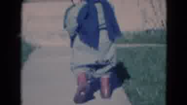 Middletown Pennsylvania (1975): Two Little Children Are Bundled Up Walking Up The
