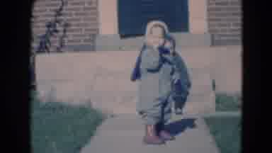 Middletown Pennsylvania (1975): Two Babies Are Sitting And A Child Is Eating After