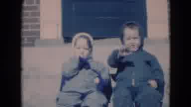 Middletown Pennsylvania (1975): Children Sitting In Front Of A House With The
