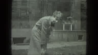 Milwaukee Wisconsin USA (1975): Woman Prepare To Play With Her Dogs Near His Home