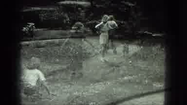 Milwaukee Wisconsin USA (1975): Couple Strolling And Children Playing Scene