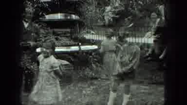Milwaukee Wisconsin USA (1975): Two Girls With A Dog And More Children Outside