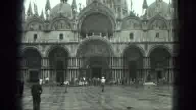 Venice Italy (1975): Several People Walk Towards A Historical Looking Building To