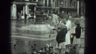 Venice Italy (1975): Woman And Three Girls Dressed Alike Feeding Many Pigeons In A