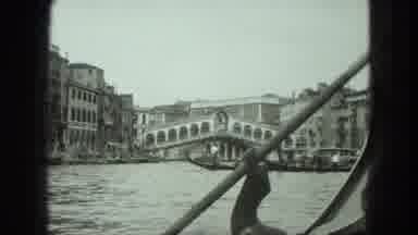 Venice Italy (1975): A View Of People Pulling A Boat Close To The Shore