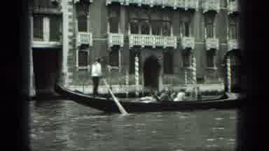 Venice Italy (1975): Man Steering Gondola On Canal Near Two Story Brick Building