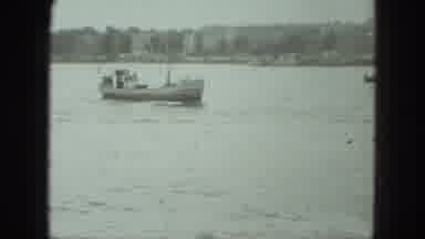 Venice Italy (1975): Several Small Boats Sail Into The Port From The Sea