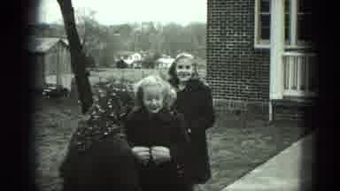 Milwaukee Wisconsin USA (1975): Three Young Happy Girls Wearing Coats Walk Away