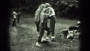 Milwaukee Wisconsin USA (1975): Girls Outside Playing A Balancing Game On Pieces