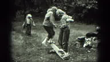 Milwaukee Wisconsin USA (1975): Family Gathering Shows People Standing On A Stick