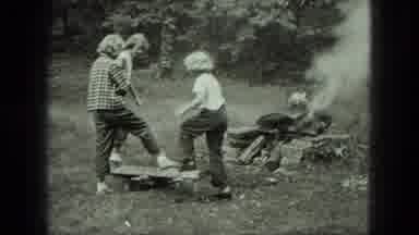 Milwaukee Wisconsin USA (1975): Three Children Having Fun Outside On A Homemade