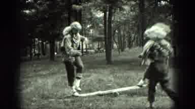 Milwaukee Wisconsin USA (1975): Mom And Her Kids Playing Together In The Park