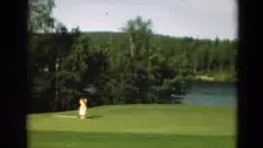 Duluth Minnesota USA (1975): A Video Of A Women Hitting A Golf Ball At A Golf