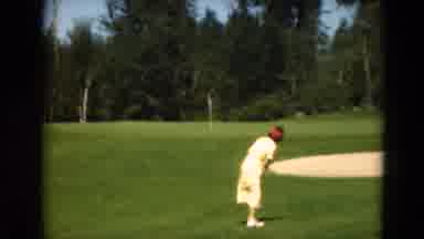 Duluth Minnesota USA (1975): A Woman Dressed In Yellow Playing Golf With The Ball
