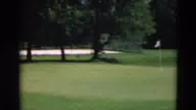 Duluth Minnesota USA (1975): Golf Ball Rolling And Bouncing Onto The Putting Green
