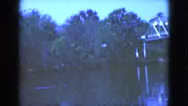 Florida USA (1975): Old Video Of A Bridge And A Forest Along A Slow Moving River
