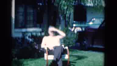 Florida USA (1975): Old Man In A Park Watching A Woman Near A Fountain