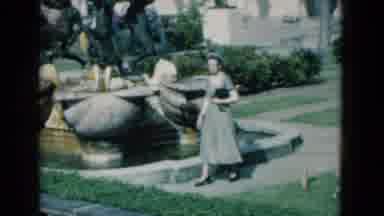 Florida USA (1975): A Lady Walking And Looking At A Monumental Garden And Building