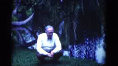 Florida USA (1975): Older Man Outside Near A Pond Looking At And Interacting With