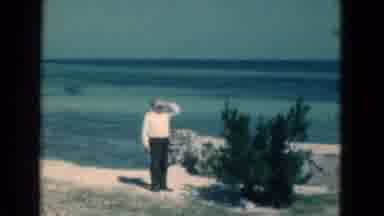 Florida USA (1975): Old Man Sight Sees At The Ocean While The Sun Is In His Eyes