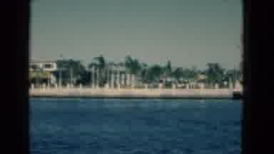 Florida USA (1975): Blue Ocean With Buildings And Palms Trees And A Shot Of A