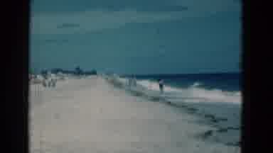 Florida USA (1975): A Group Of People Enjoying The Beach On A Pretty Day